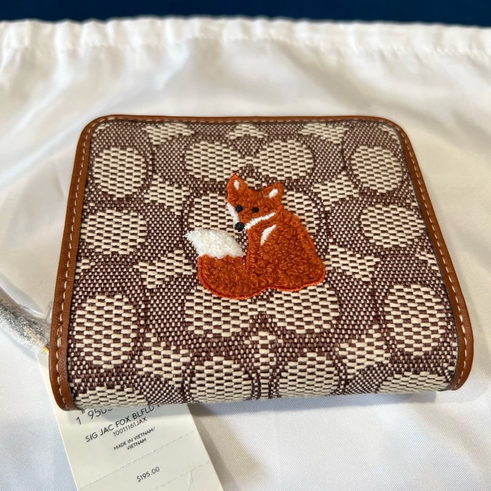 Coach Billfold wallet in signature textile with a cute Fox motif